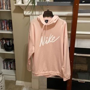Pink Nike hoodie. XL. Feels like wet dry outside. Soft inside.  Very comfy